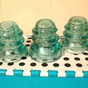 Three antique glass insulators